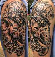 White Buffalo Arts Custom Tattoos & Piercing