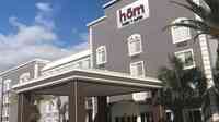 h?m hotel + suites a Trademark Collection Hotel by Wyndham