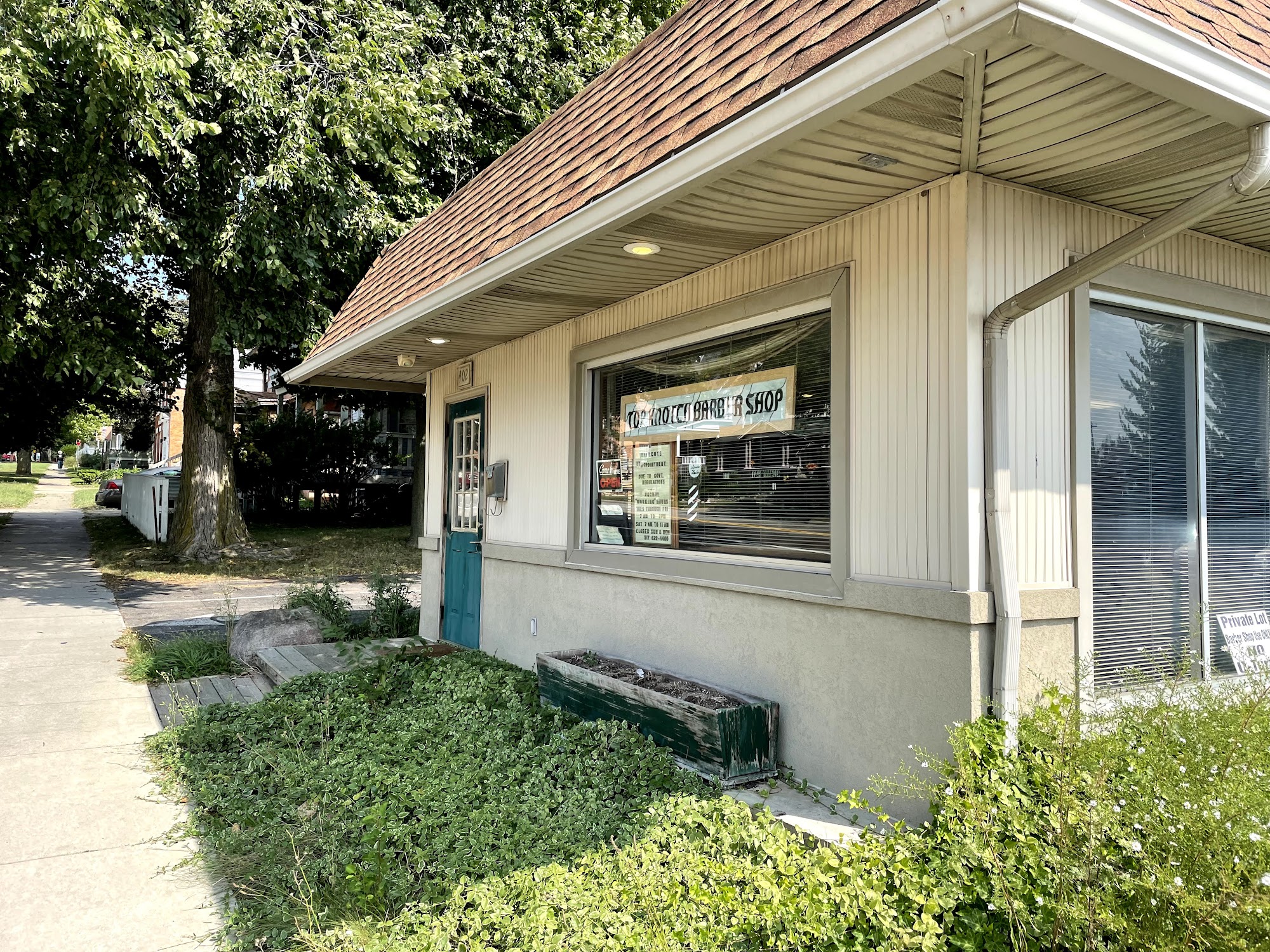 Top Knotch Barber Shop 402 N Superior St, Albion Michigan 49224